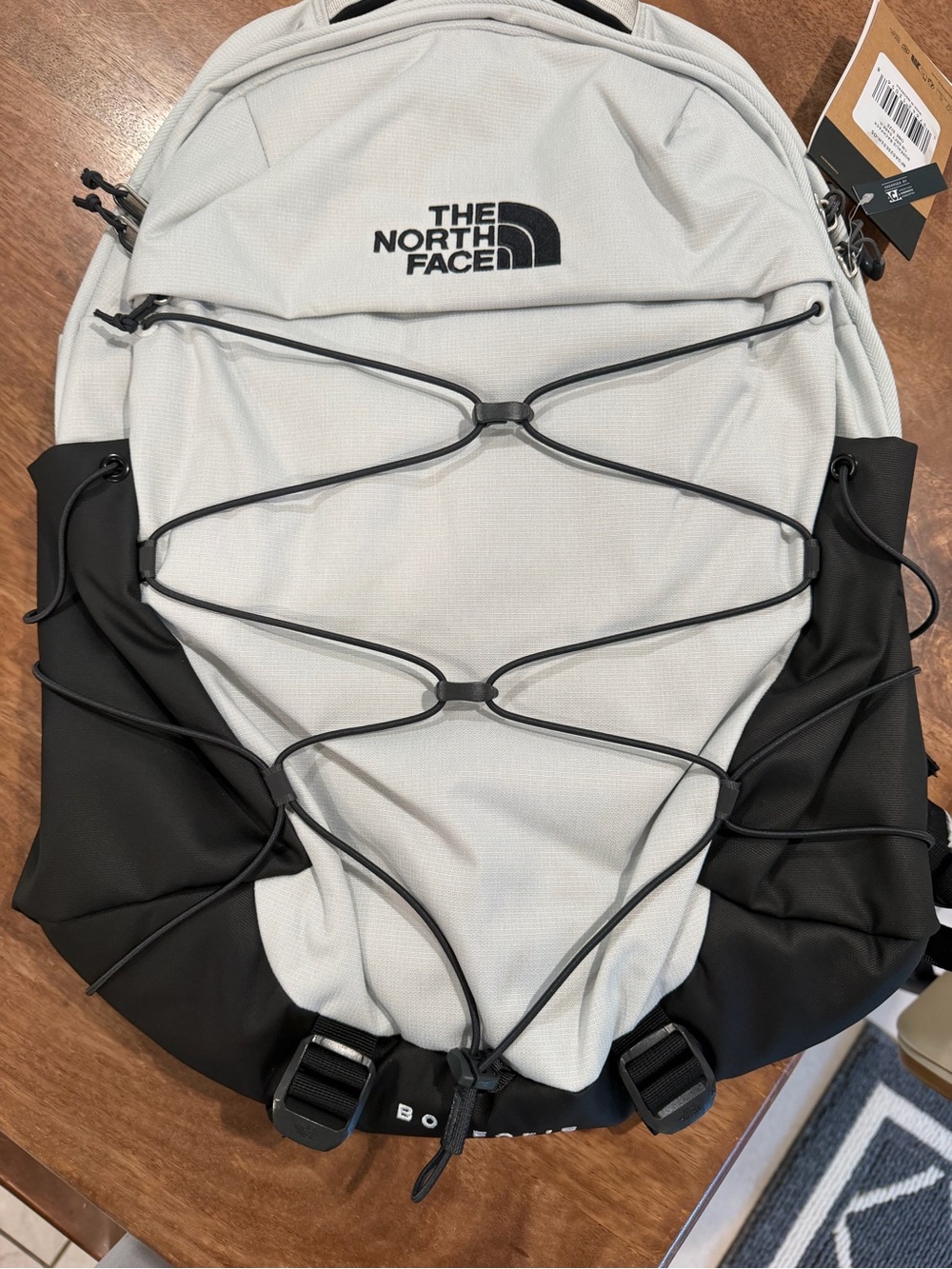 The North Face Light Gray and Black Men's Backpack with Bungee Front